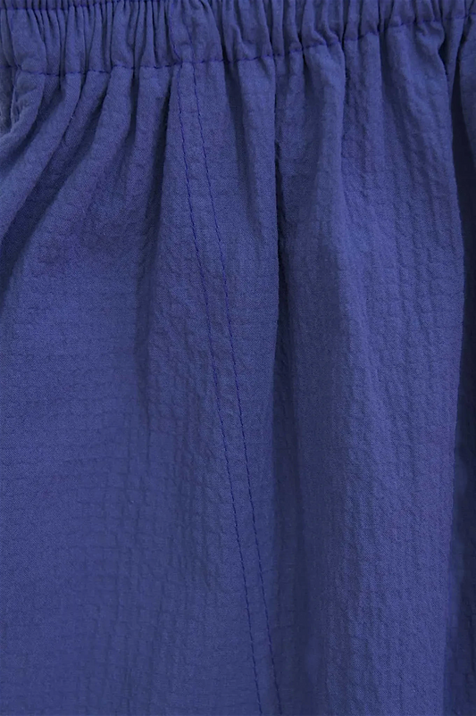 Lefke Legacy indigo cotton shalwar featuring a textured plain-weave fabric and a comfortable drawstring waist.